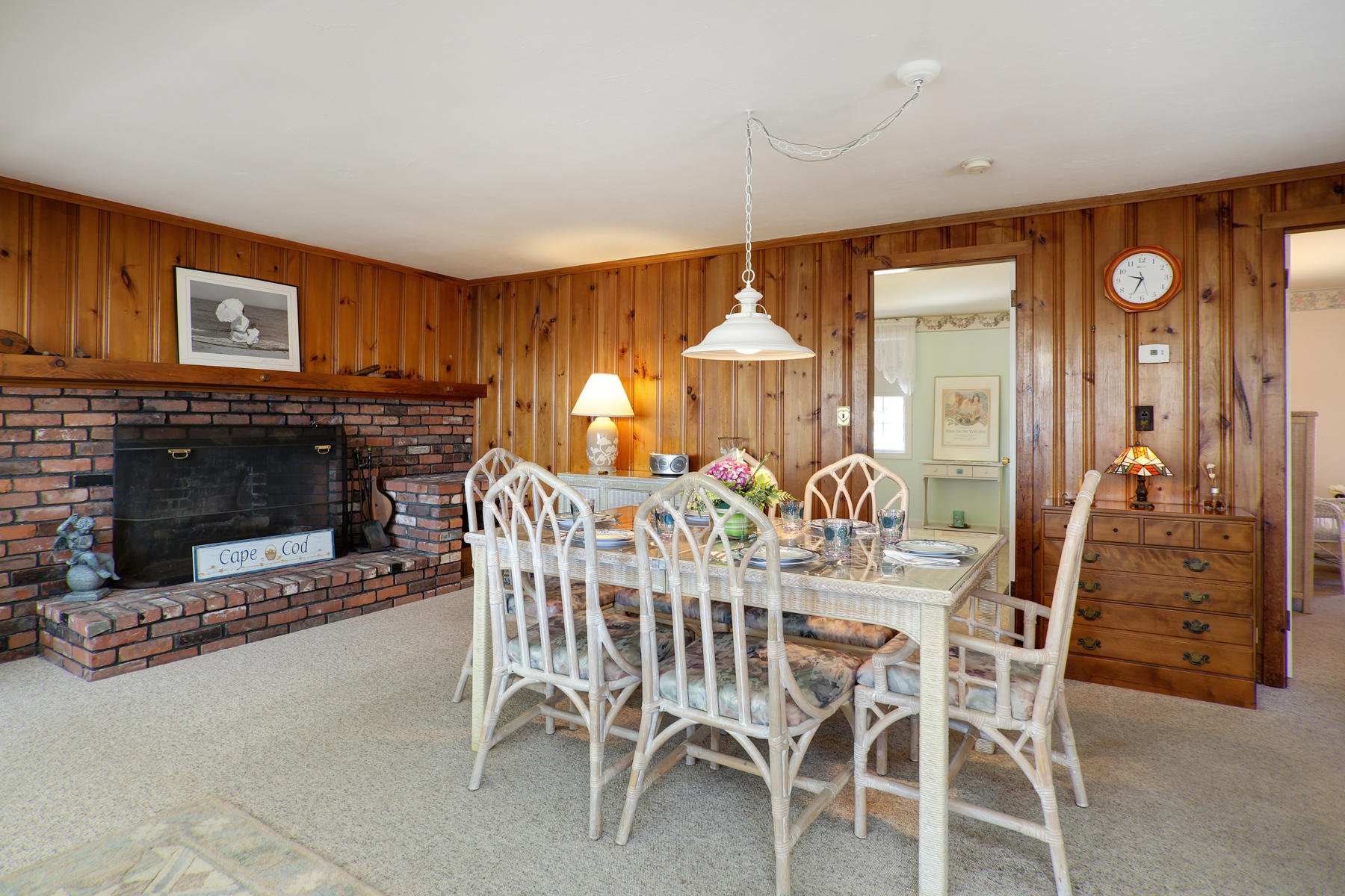 256 Monomoscoy Road Mashpee, MA 02649 - Photo 10 of 28 a view of a dining room with furniture window and outside view