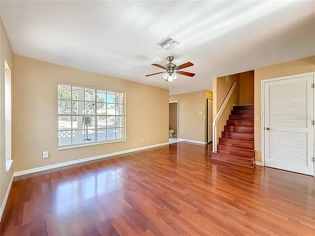 a kitchen with stainless steel appliances granite countertop a stove microwave and sink