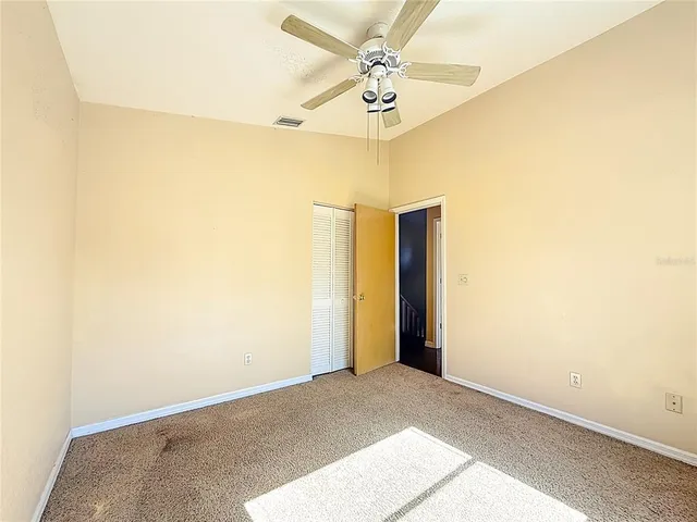 a bathroom with a shower and a sink