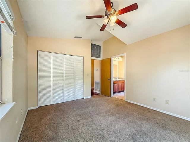 an aerial view of residential houses with outdoor space and street view