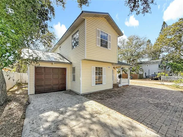 a view of a door and wooden floor