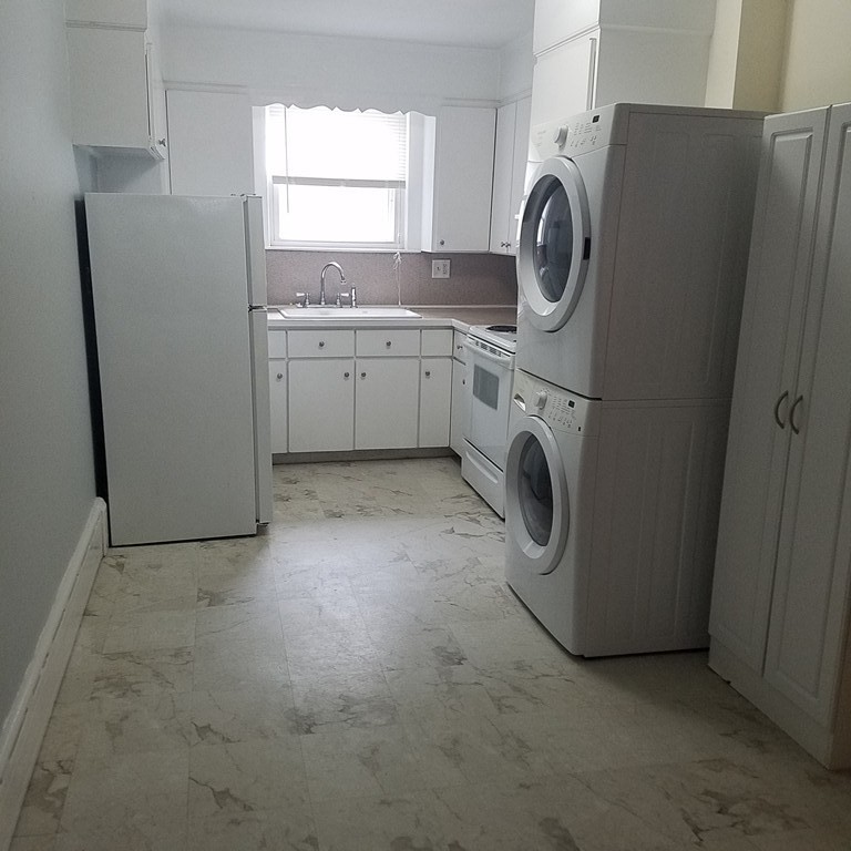 1 Spray Avenue Revere, MA 02151 - Photo 32 of 36 a utility room with dryer and washer