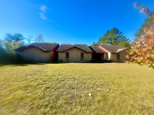 a house view with a lake
