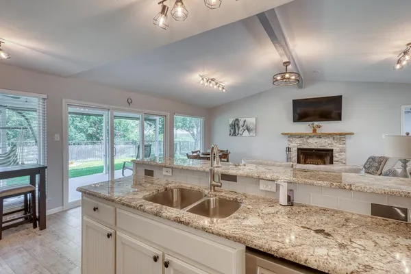 a view of storage and utility room with washer and dryer