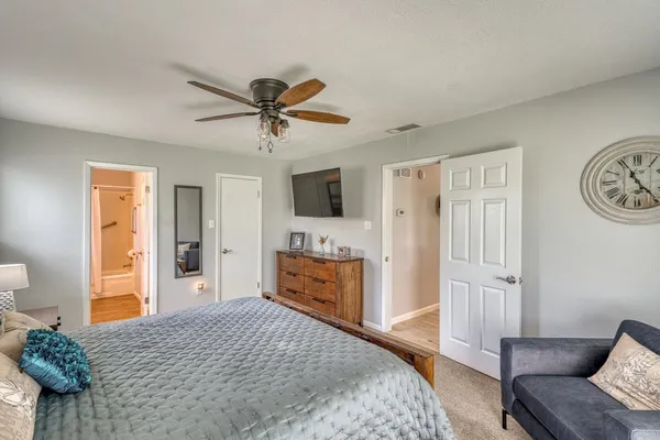 a bathroom with a sink toilet tub and shower