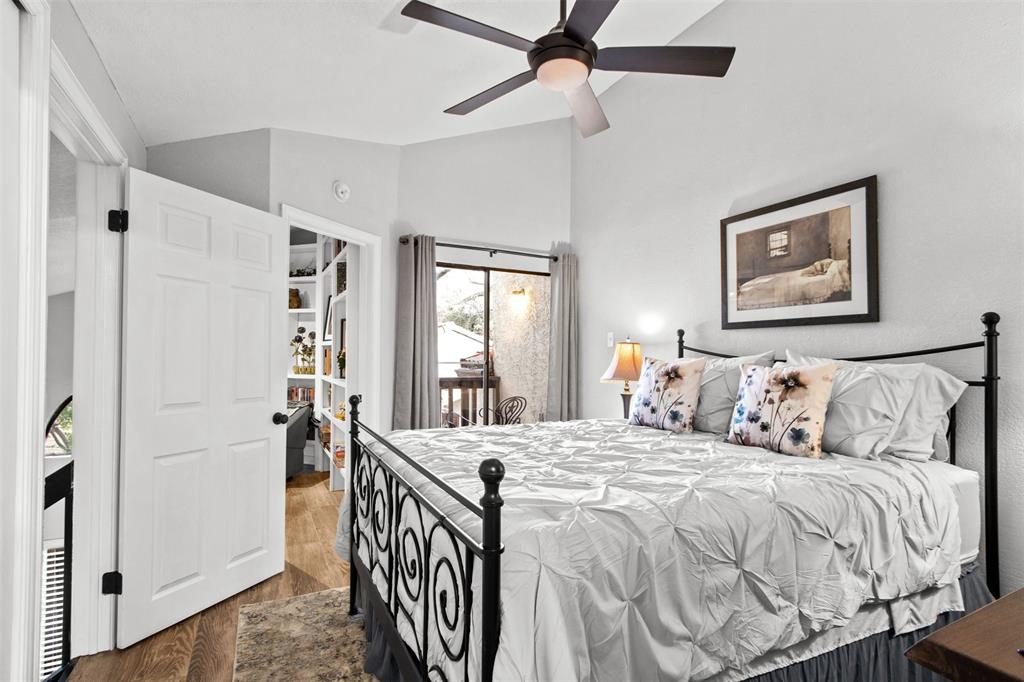 18040 Midway Road, Unit 103 Dallas, TX 75287 - Photo 17 of 38 a bedroom with a bed and a window