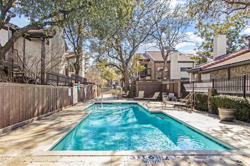 18040 Midway Road, Unit 103 Dallas, TX 75287 - Photo 29 of 38 a view of a backyard with a patio
