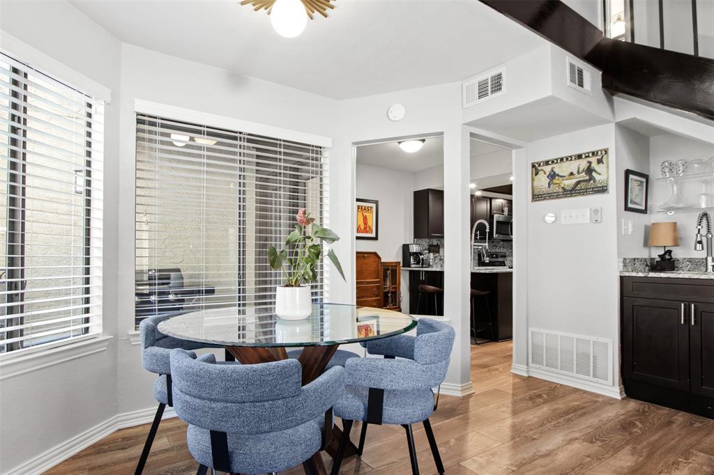 18040 Midway Road, Unit 103 Dallas, TX 75287 - Photo 3 of 37 a dining room with furniture and window
