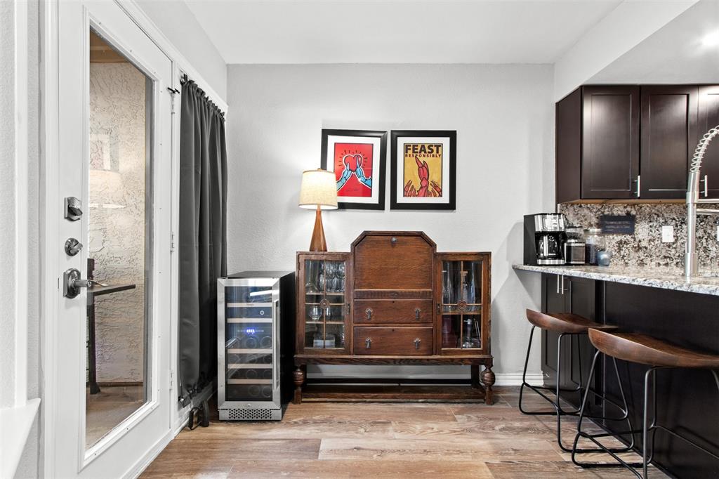 18040 Midway Road, Unit 103 Dallas, TX 75287 - Photo 5 of 37 a room with closet a mirror and a glass door shower