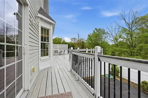 a view of a chairs on the roof deck