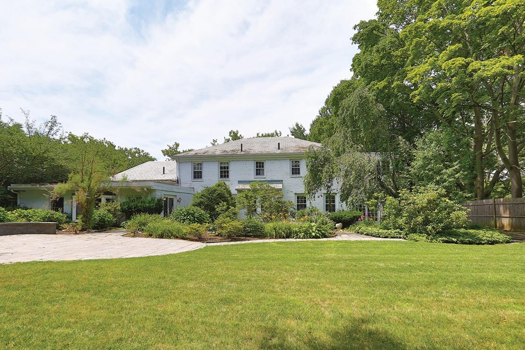 119 Walnut Hill Road Brookline, MA 02467 - Photo 12 of 12 a view of a house with a garden