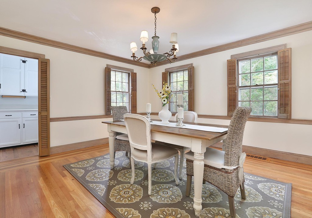 119 Walnut Hill Road Brookline, MA 02467 - Photo 3 of 12 a view of a dining room with furniture window and wooden floor