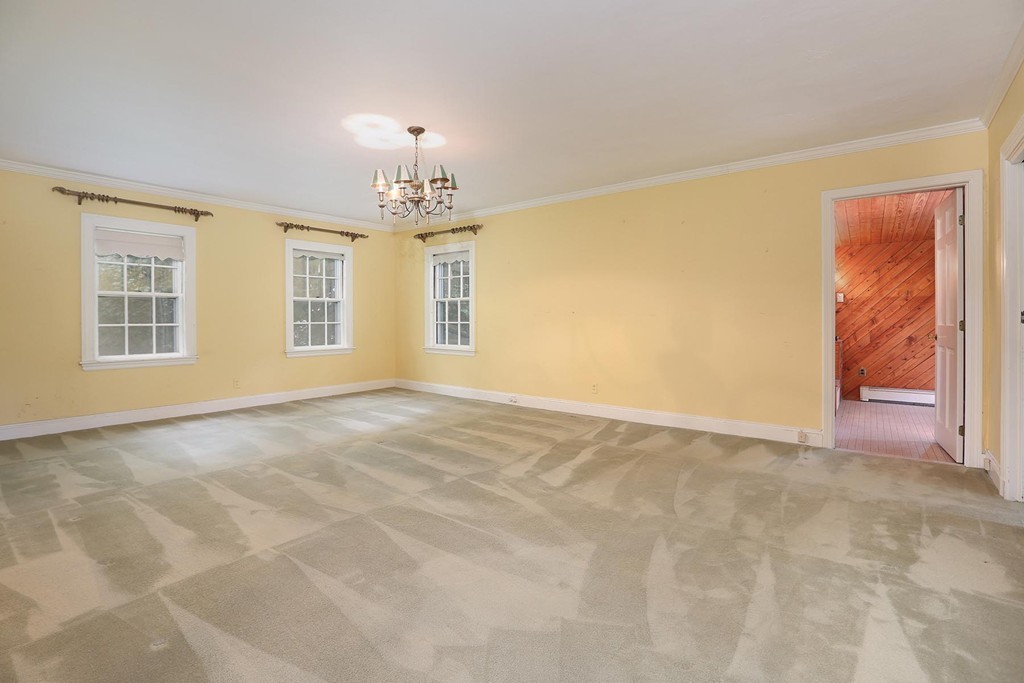 119 Walnut Hill Road Brookline, MA 02467 - Photo 7 of 12 a view of an empty room with a window
