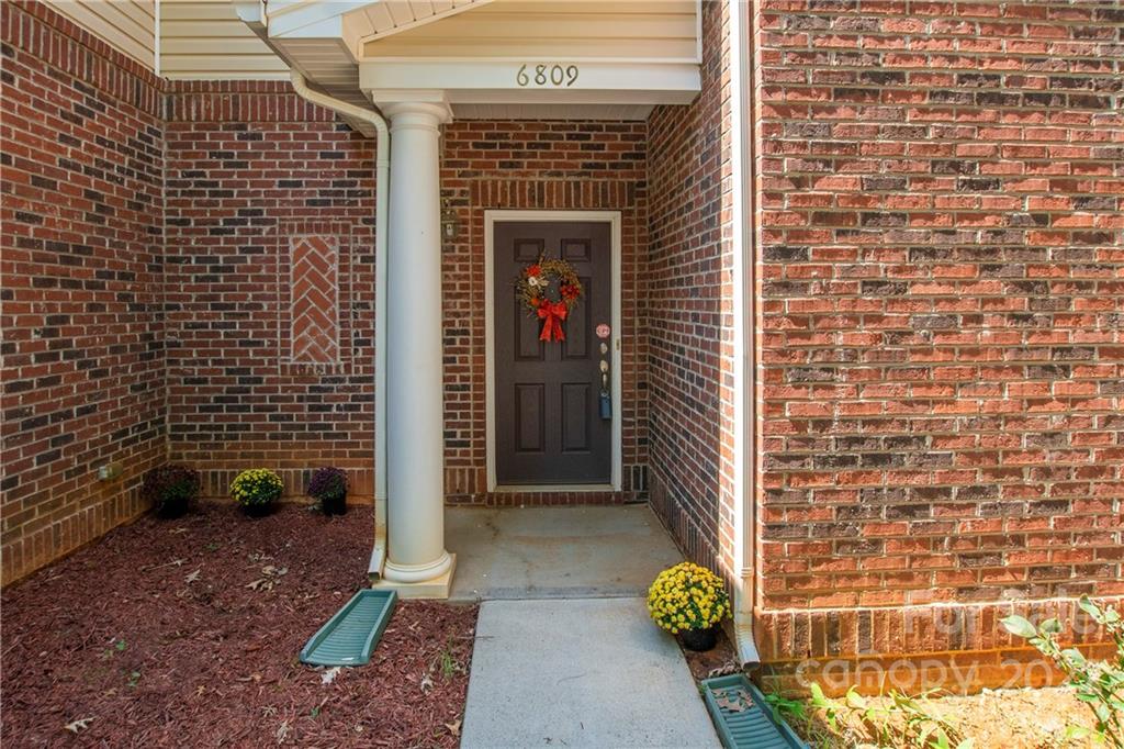 6809 Evanton Loch Road Charlotte, NC 28278 - Photo 2 of 30 a view of entrance gate of the house