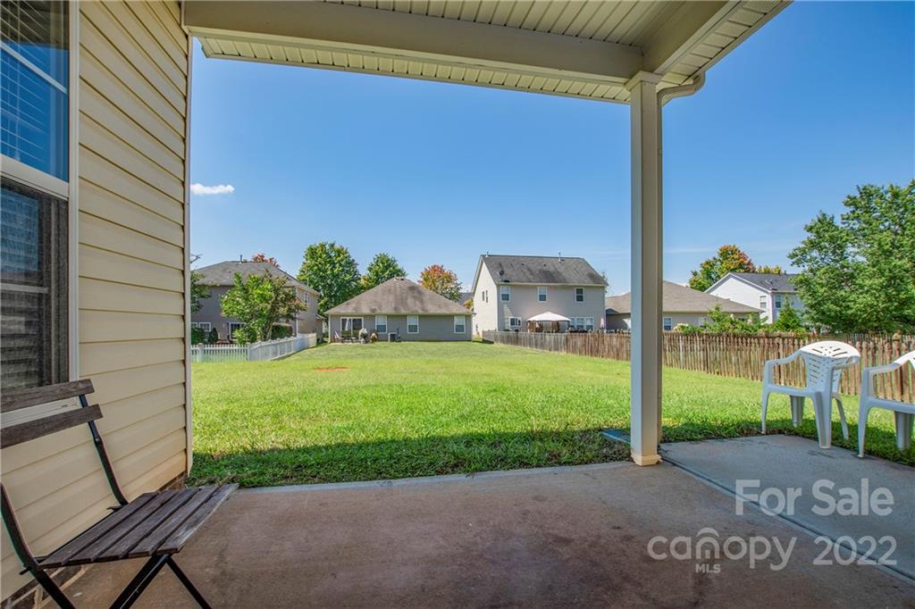 6809 Evanton Loch Road Charlotte, NC 28278 - Photo 23 of 30 a view of a backyard with sitting area