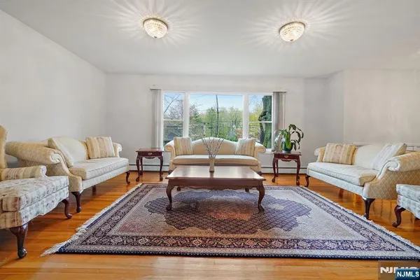 a living room with furniture and a table