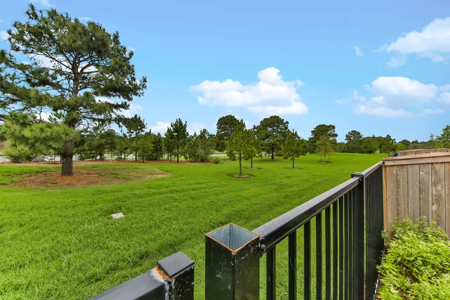 a city view from a balcony with outdoor space
