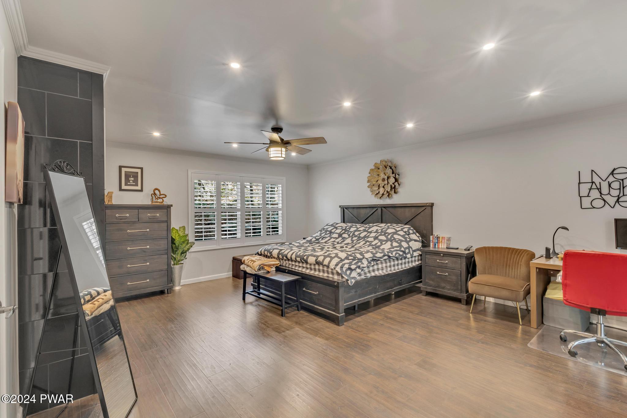 2596 Boulder Road Lake Ariel, PA 18436 - Photo 19 of 57 a bedroom with a bed and furniture