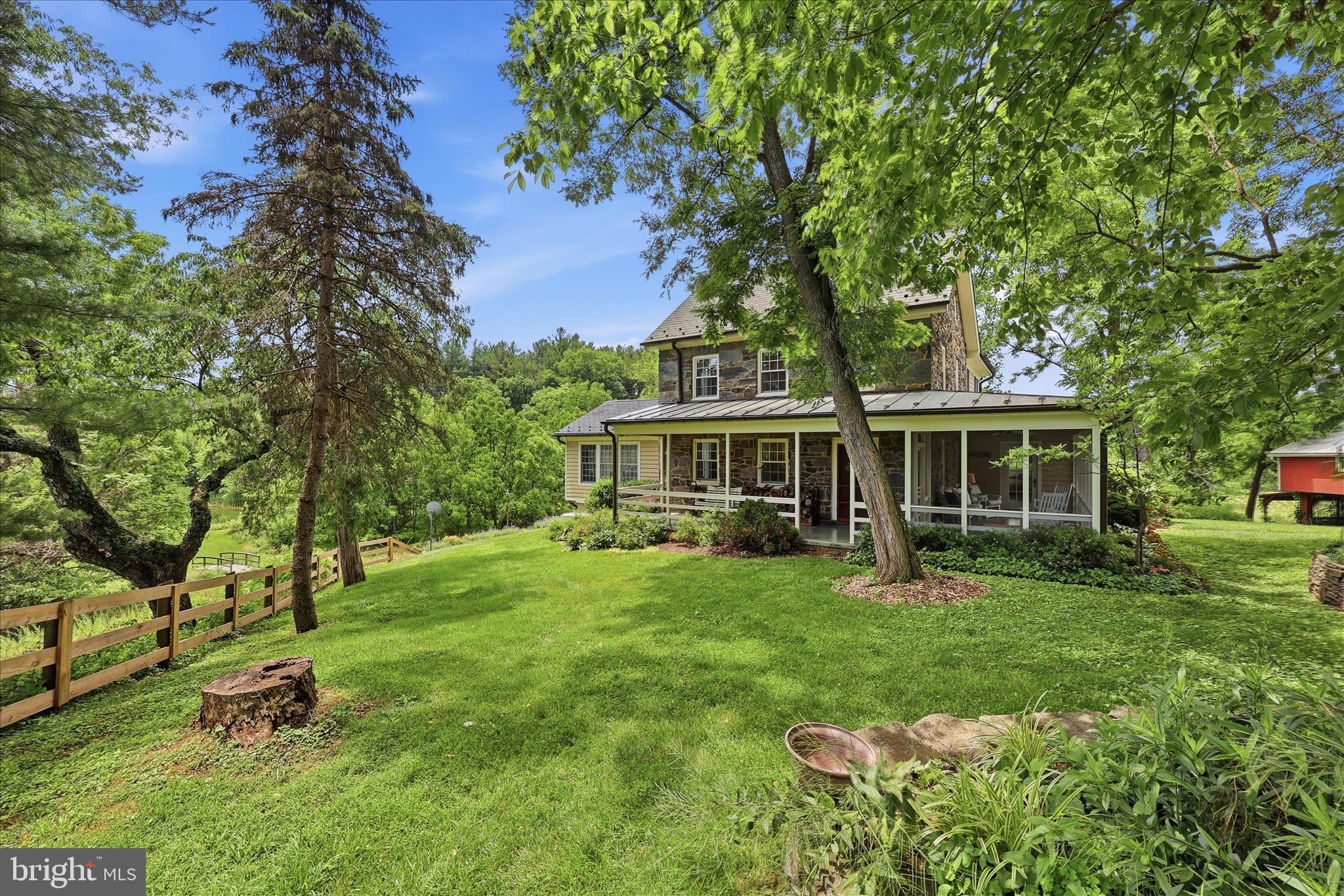 10919 Etzler Mill Road Woodsboro, MD 21798 - Photo 51 of 54 a view of a house with a yard