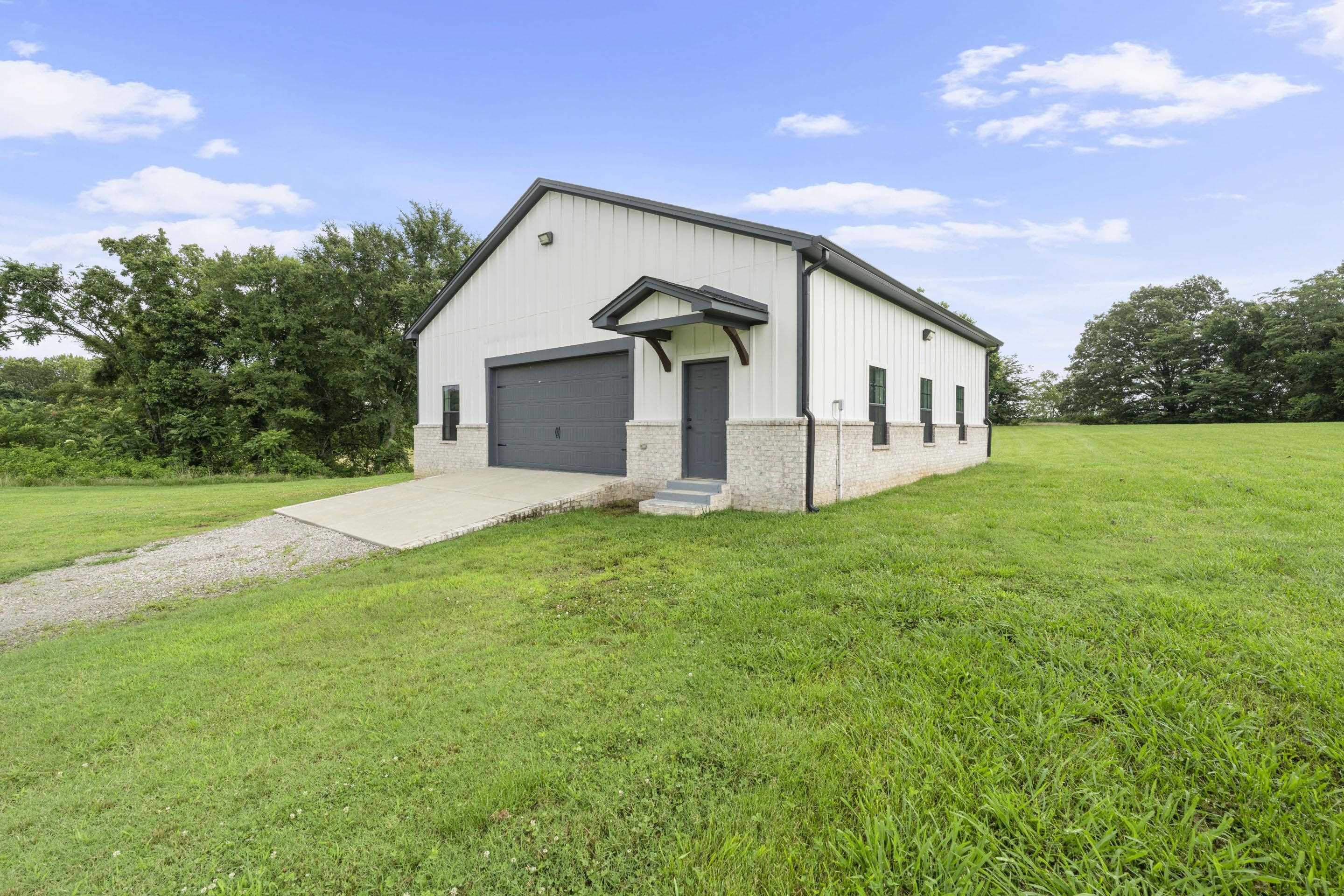 2295 Tomlin Road Somerville, TN 38068 - Photo 35 of 38 View of outdoor structure featuring gravel driveway
