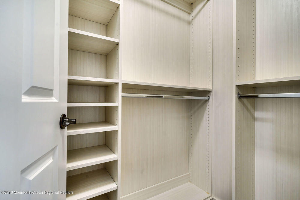11 Lighthouse Point Road, Unit 601 Highlands, NJ 07732 - Photo 38 of 79 a view of walk in closet with empty racks
