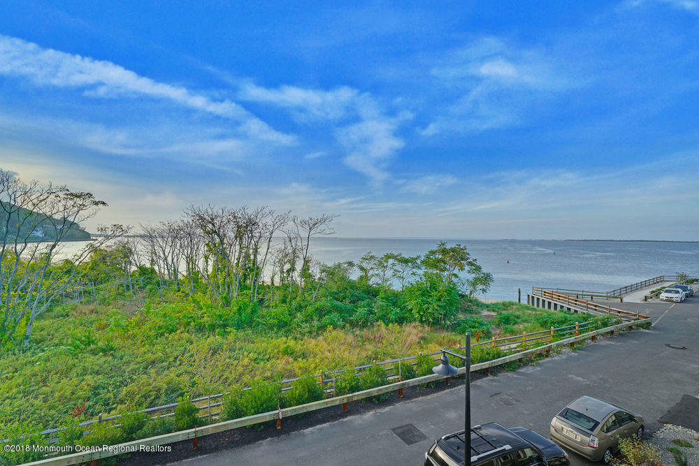 11 Lighthouse Point Road, Unit 601 Highlands, NJ 07732 - Photo 53 of 79 a view of a garden with an outdoor space