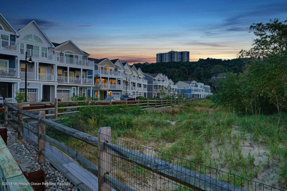 11 Lighthouse Point Road, Unit 601 Highlands, NJ 07732 - Photo 66 of 79 a view of multiple houses with a big yard