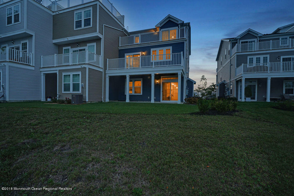 11 Lighthouse Point Road, Unit 601 Highlands, NJ 07732 - Photo 70 of 79 a brick building that has a lots of windows in it