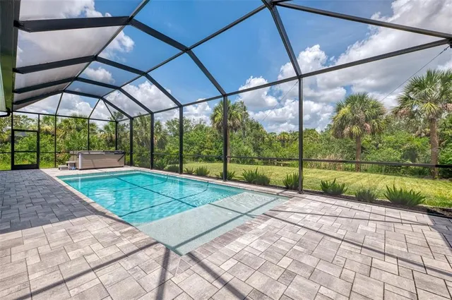 a view of a backyard with a small yard