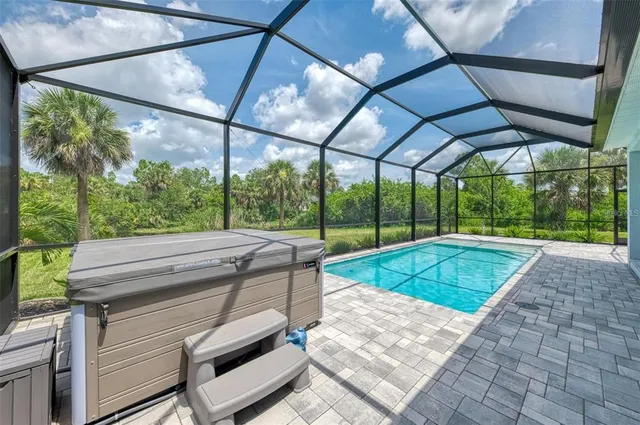 a view of outdoor space with swimming pool