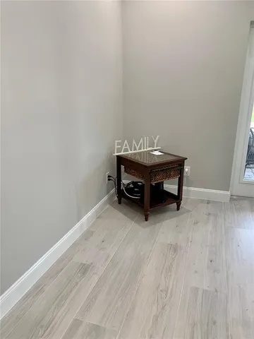 a bedroom with bed and window