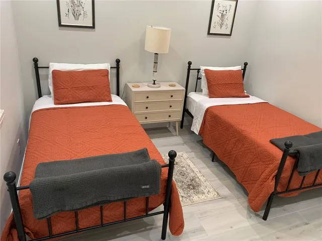 a view of a livingroom with furniture and windows