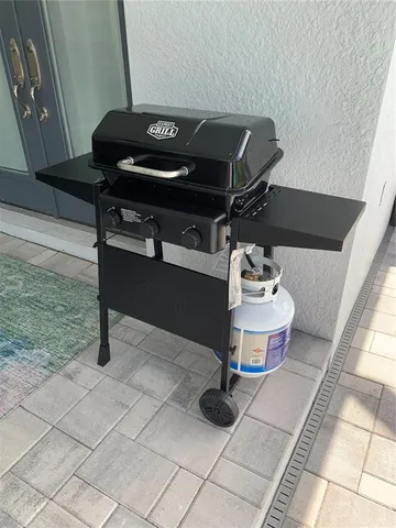 a living room with furniture and a gate