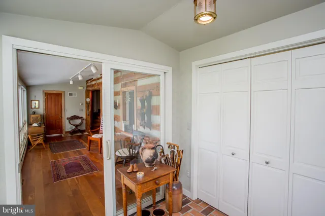 a view of living room with furniture and flat screen tv