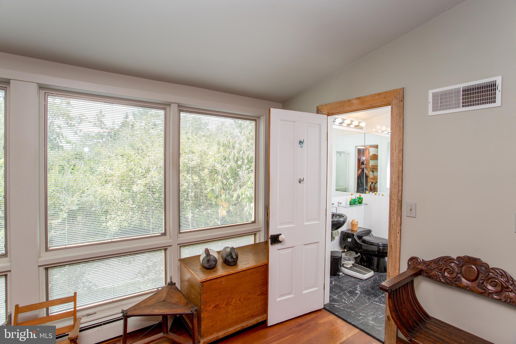 3416 Bursonville Road Riegelsville, PA 18077 - Photo 18 of 69 a view of a room with furniture and a window