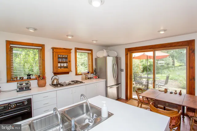 a bathroom with a sink and mirror