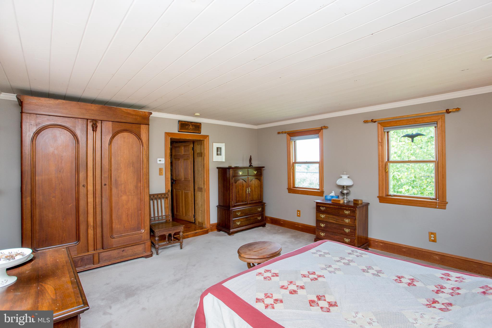 3416 Bursonville Road Riegelsville, PA 18077 - Photo 32 of 69 a bedroom with furniture and a window