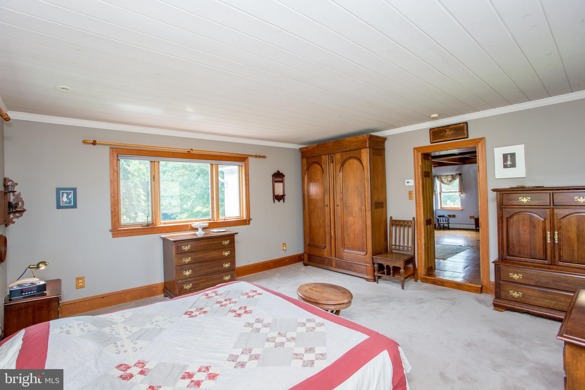 3416 Bursonville Road Riegelsville, PA 18077 - Photo 33 of 69 a bedroom with a bed and a dresser
