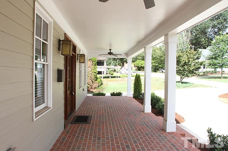 508 Mial Street Raleigh, NC 27608 - Photo 4 of 25 The front porch is deep and spans the front of the home. High end lighting inside and out.