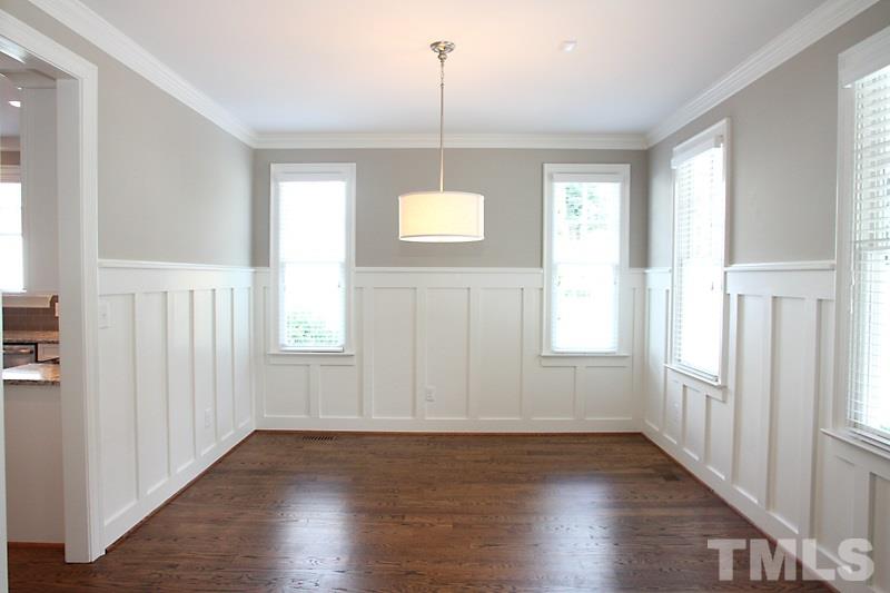 508 Mial Street Raleigh, NC 27608 - Photo 5 of 25 The dining room is accented by wainscoting. Moldings are found throughout the home.