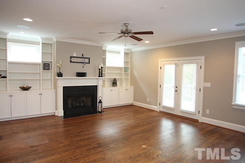 508 Mial Street Raleigh, NC 27608 - Photo 8 of 25 This is a WOW family room is open to the kitchen with built ins, surround sound (including subwoofer), gas fireplace w/ tv mount above, recessed lighting, floor outlet and fan. A great entertaining space...French doors lead to the screened porch.