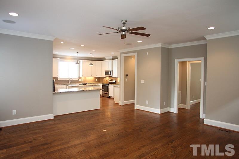 508 Mial Street Raleigh, NC 27608 - Photo 10 of 25 The view from the family room to the kitchen. See how spacious and open it is.
