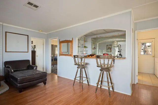 a bathroom with a sink double vanity and a mirror