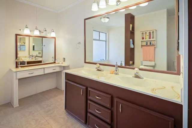 a view of a dining room with furniture kitchen and wooden floor