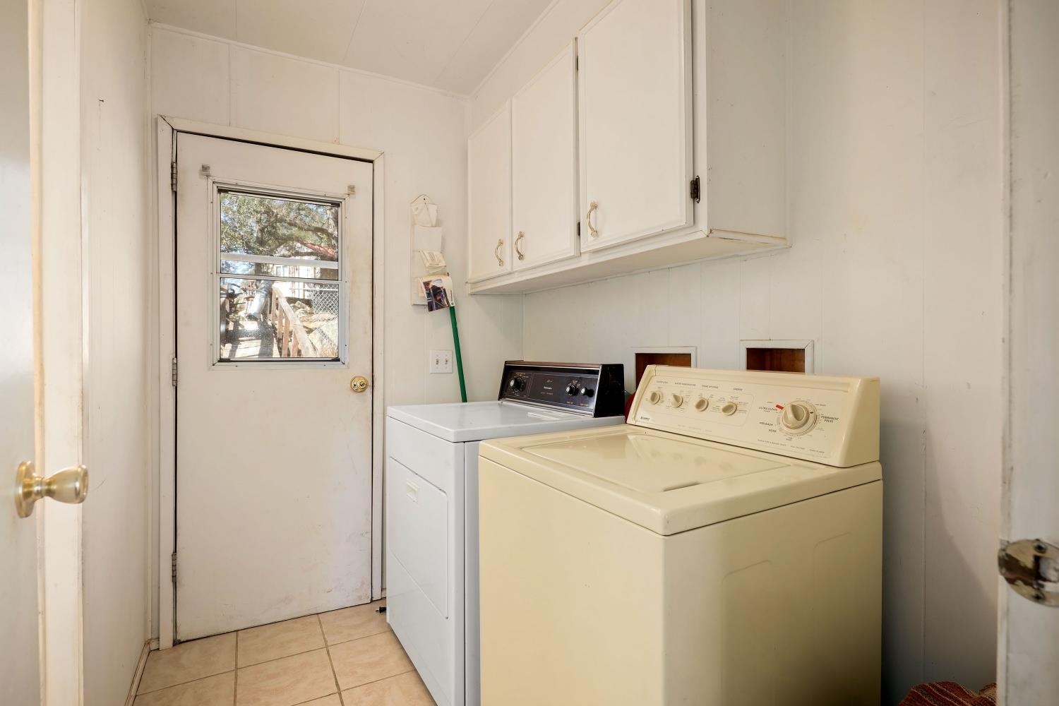 7080 Gwin Street Valley Springs, CA 95252 - Photo 34 of 96 a utility room with dryer and washer