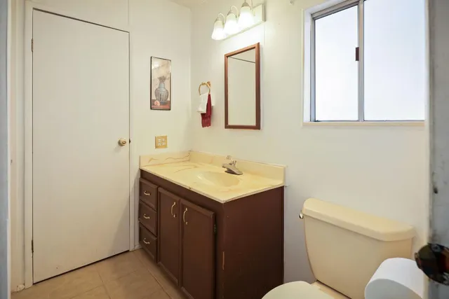 a view of a balcony with chairs