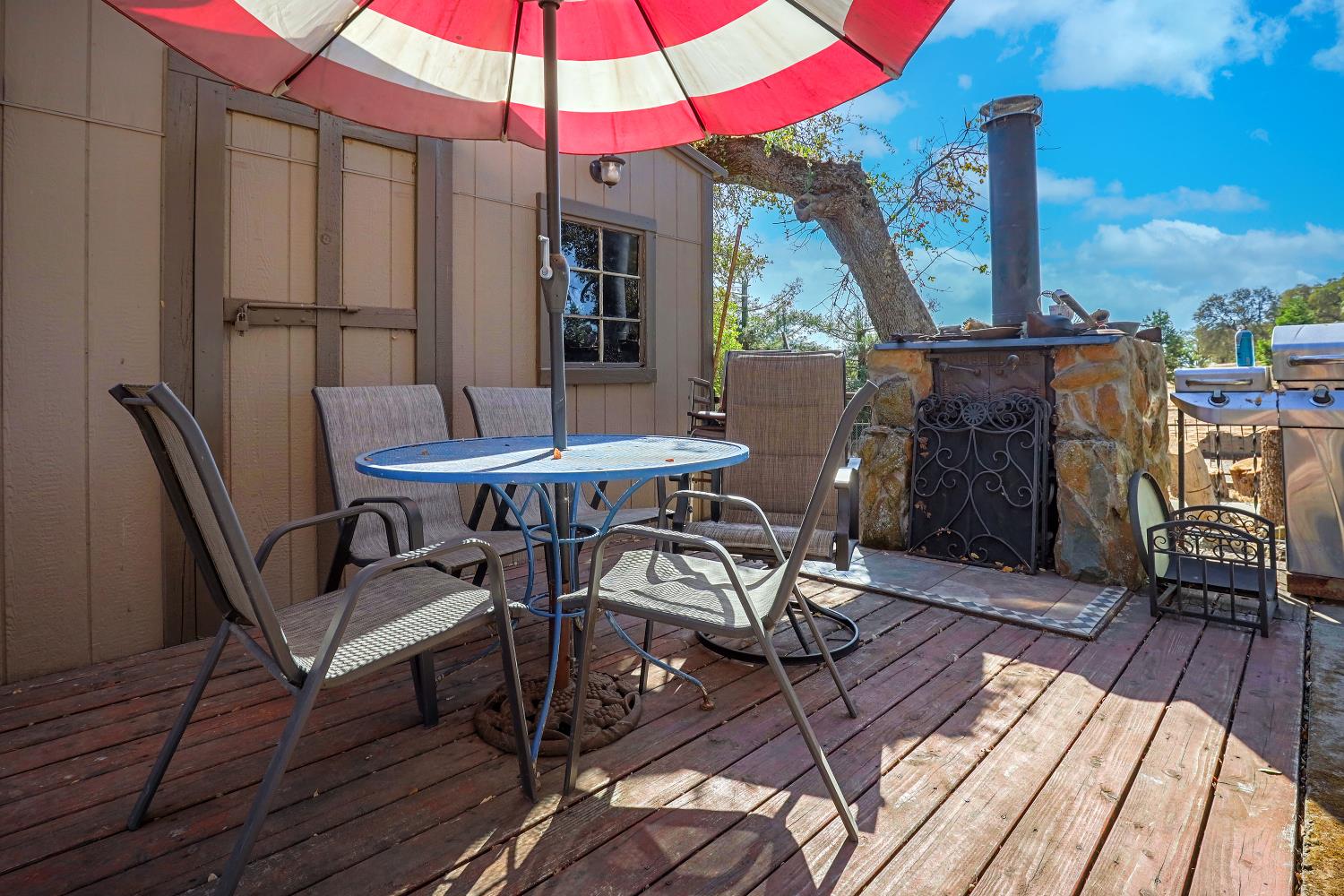 7080 Gwin Street Valley Springs, CA 95252 - Photo 41 of 96 a view of a balcony with furniture and wooden floor
