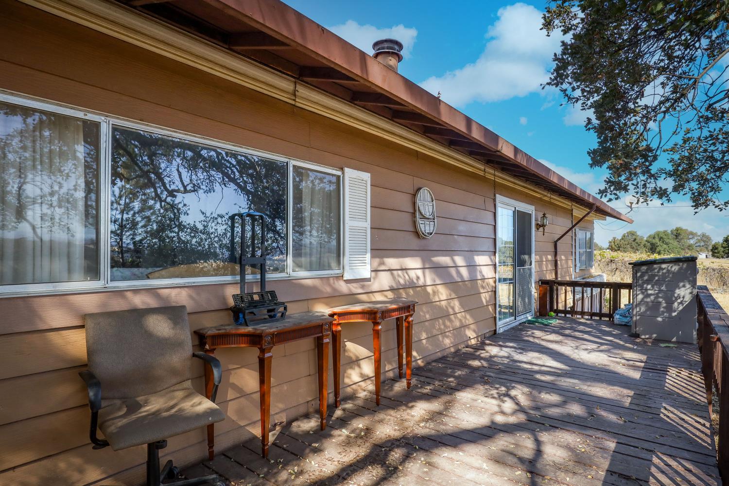 7080 Gwin Street Valley Springs, CA 95252 - Photo 68 of 96 a backyard of a house with table and chairs