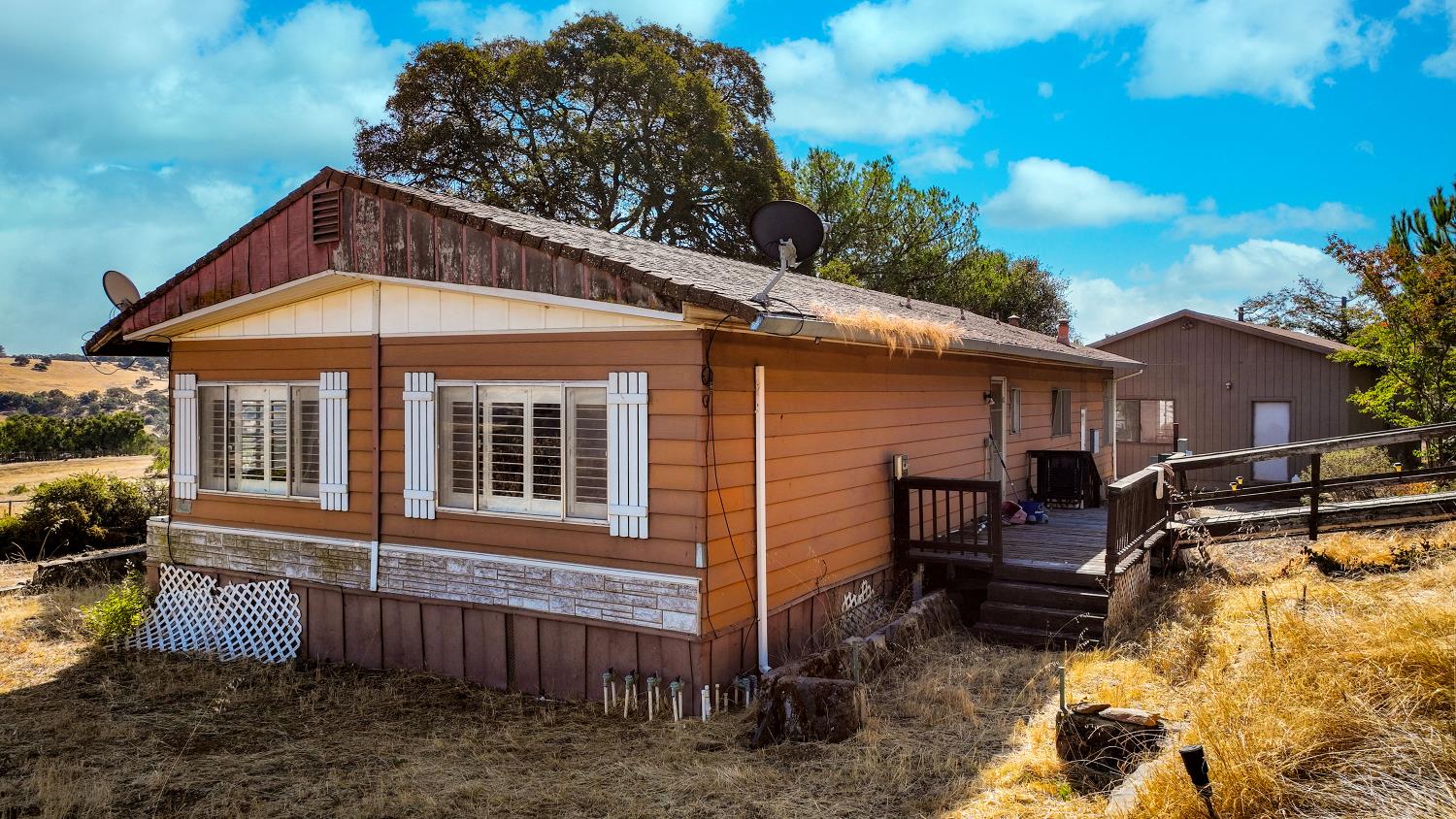 7080 Gwin Street Valley Springs, CA 95252 - Photo 91 of 96 a view of a house with a yard and furniture