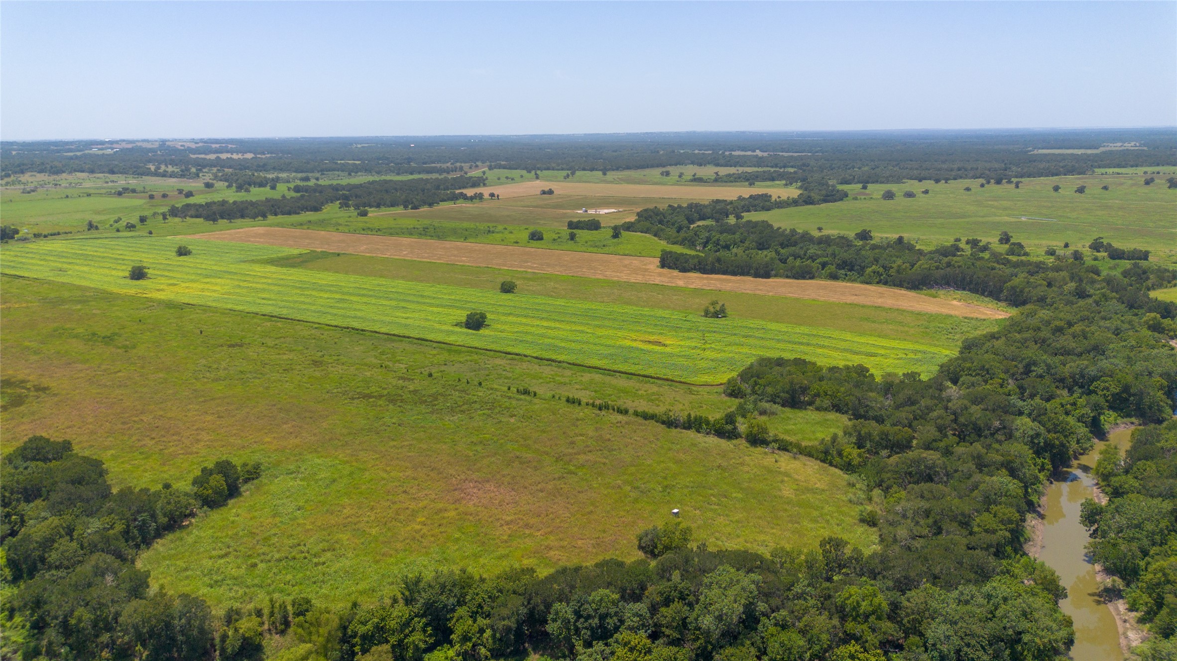 0 Devault Lane Brenham, TX 77833 - Photo 5 of 8 a view of an ocean and a mountain